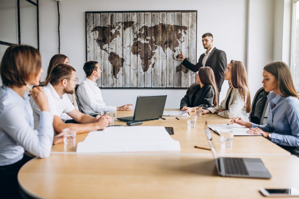 group-people-working-out-business-plan-office